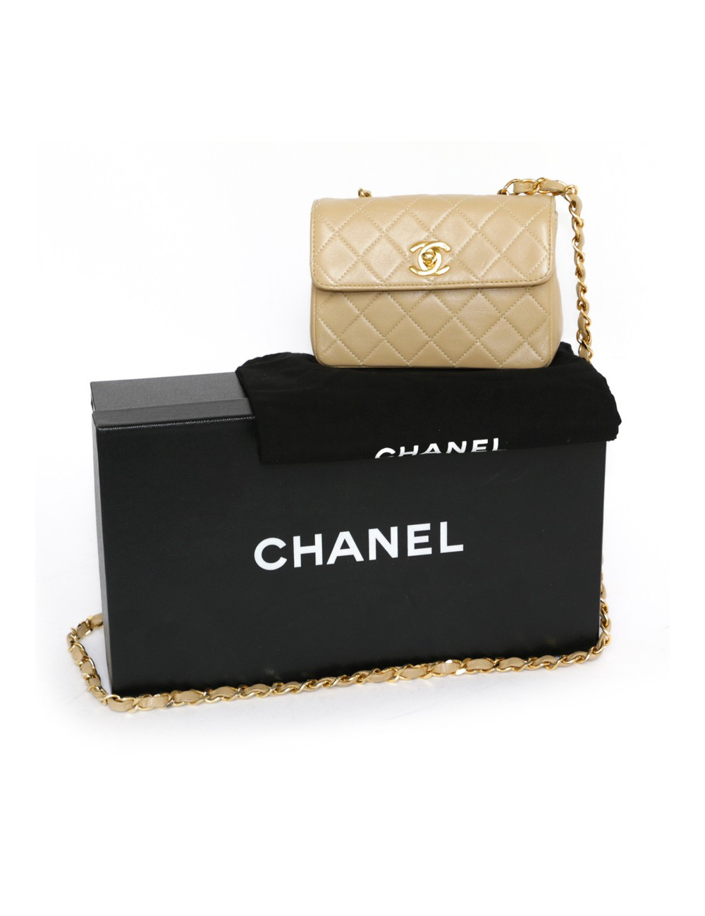 Mini quilted CHANEL bag beige