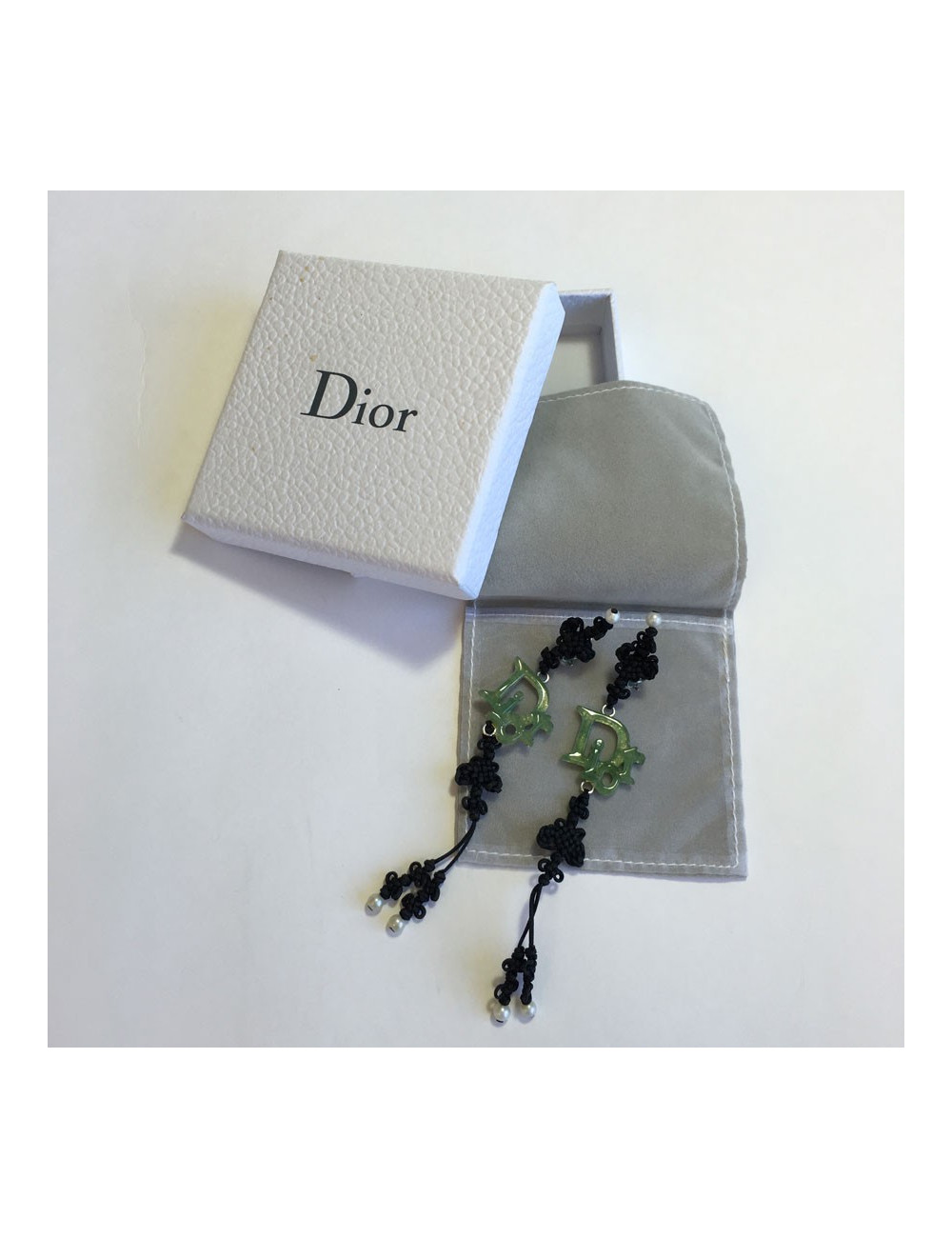 Collector DIOR clip-on earrings in fine black cord and DIOR in silver plated metal and green resin