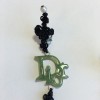 Collector DIOR clip-on earrings in fine black cord and DIOR in silver plated metal and green resin
