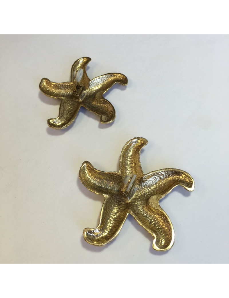 Boucles d'oreille clips YSL SAINT LAURENT étoile dorée