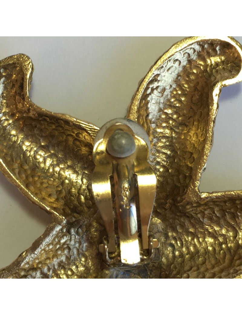 Boucles d'oreille clips YSL SAINT LAURENT étoile dorée