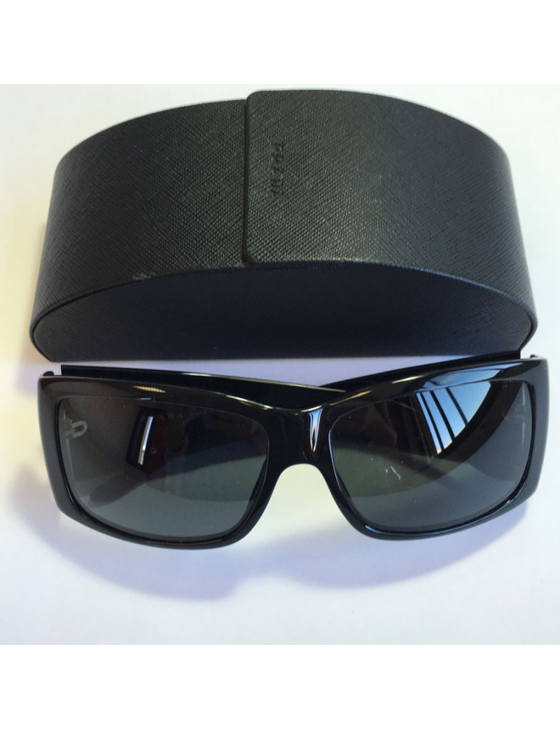Lunettes de soleil PRADA en plexi noir