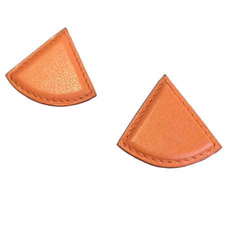 Boucles d'oreille clips HERMES en cuir orange