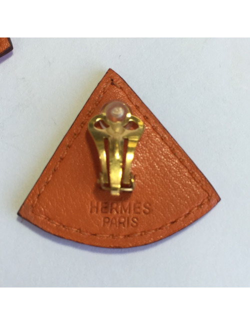 Boucles d'oreille clips HERMES en cuir orange