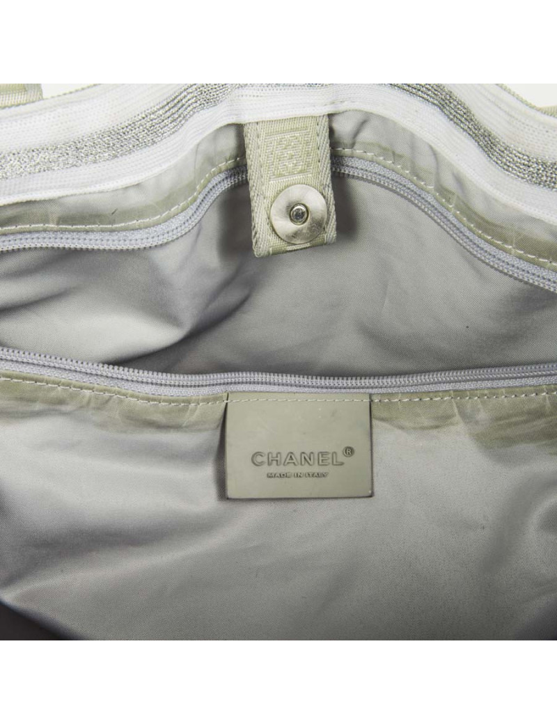Chanel 'sport line' bag in gray canvas.