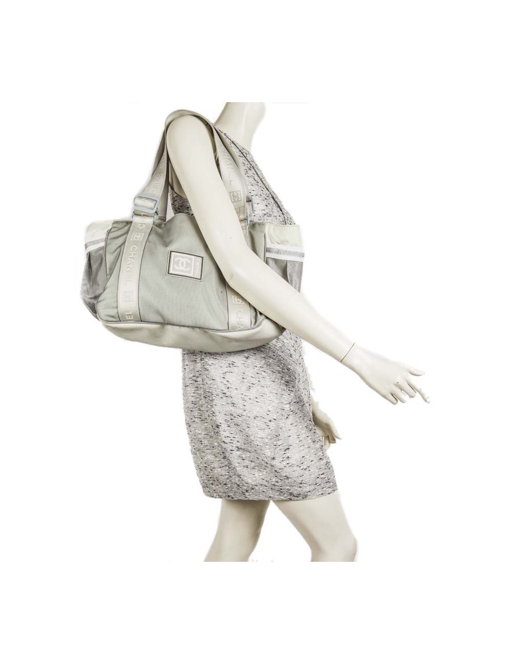 Chanel 'sport line' bag in gray canvas.
