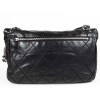 CHANEL messenger bag in black quilted smooth leather