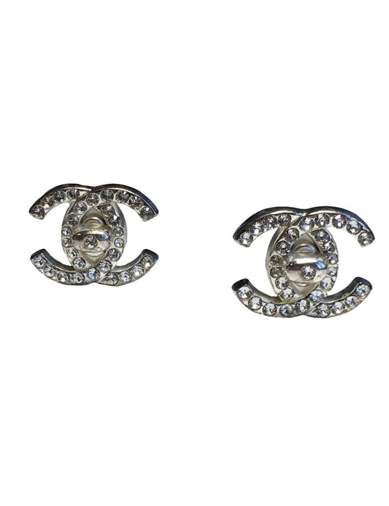 Boucles d'oreille clips CHANEL CC en métal argenté et brillants