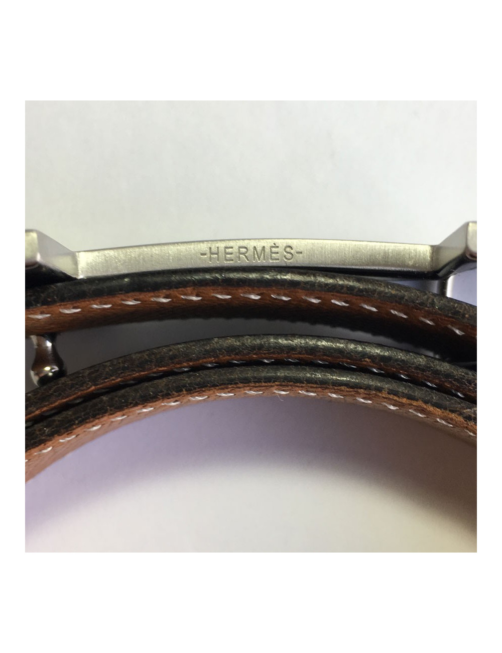 Ceinture HERMES T 75 réversible en cuir box noir et cuir grainé gold