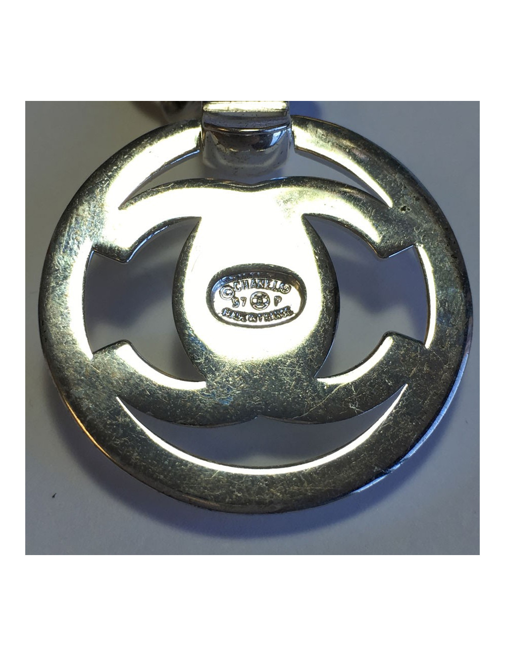 Collier CHANEL en métal argenté