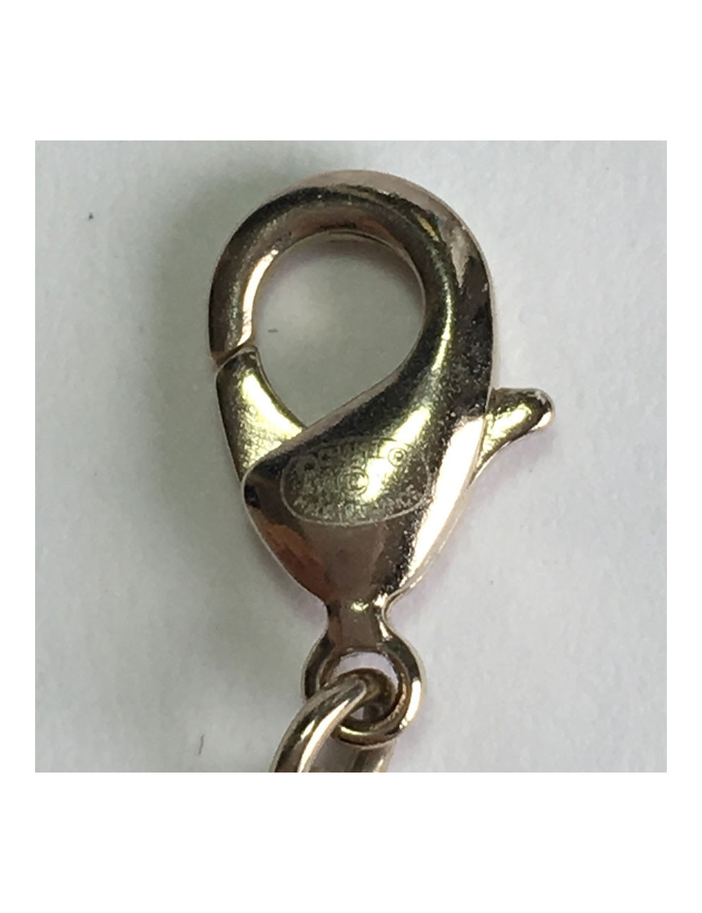 CHANEL necklace in gilt metal, CC pendant set with brilliants