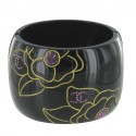 CHANEL cuff bracelet in black resin with engraved floral patterns