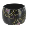 CHANEL cuff bracelet in black resin with engraved floral patterns