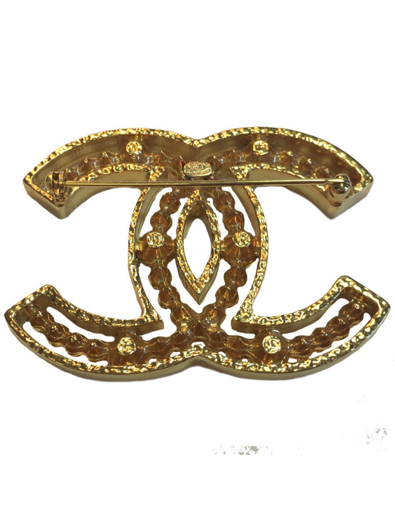 Broche CHANEL en métal doré et strass