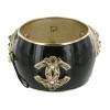 Cuff Couture CHANEL matte gold metal and black resin