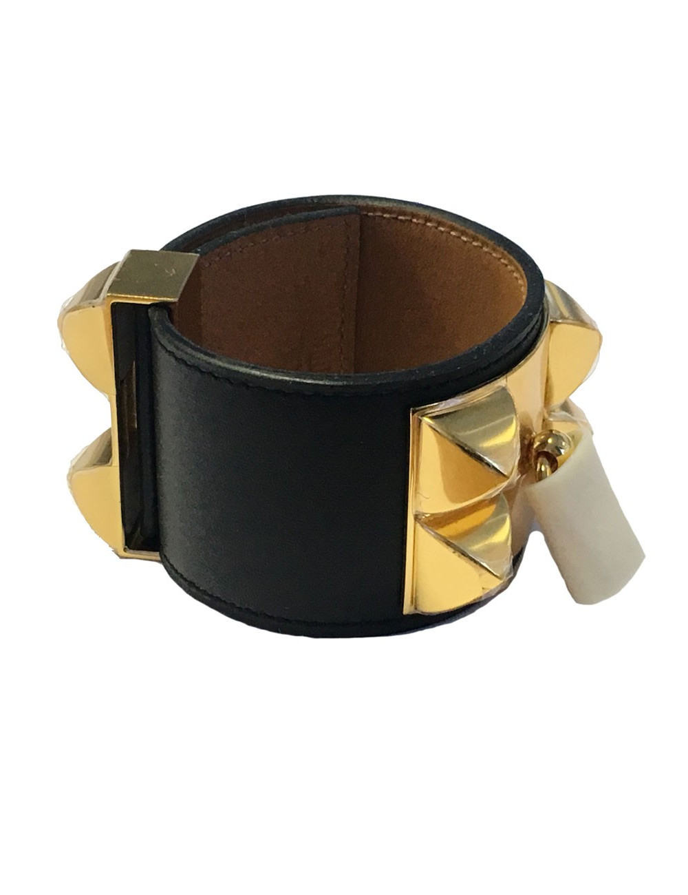 Manchette HERMES CDC en veau noir et bijouterie plaquée or