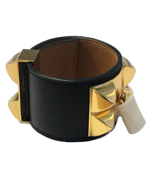 Manchette HERMES CDC en veau noir et bijouterie plaquée or