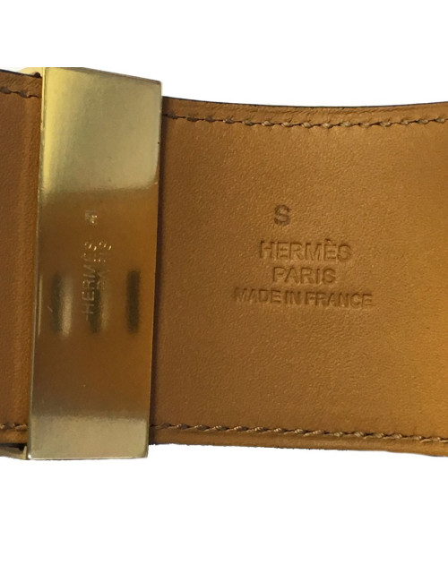 Manchette HERMES CDC en veau noir et bijouterie plaquée or