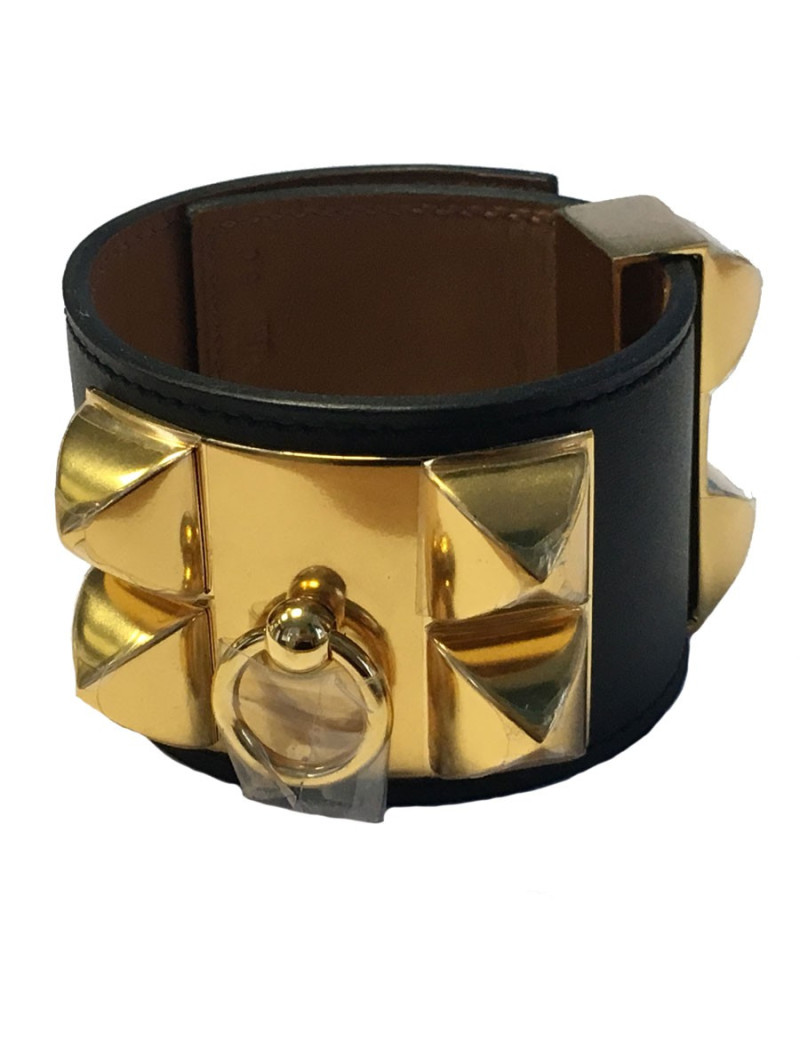 Manchette HERMES CDC en veau noir et bijouterie plaquée or