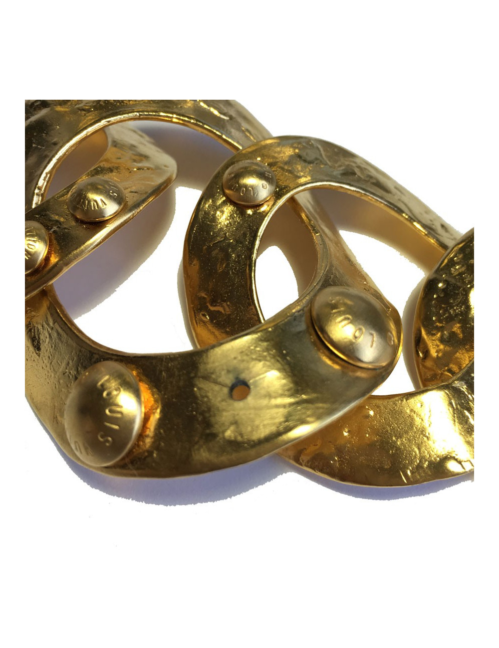 xxx Bracelet LOUIS VUITTON anneaux en métal plaqué or martelé