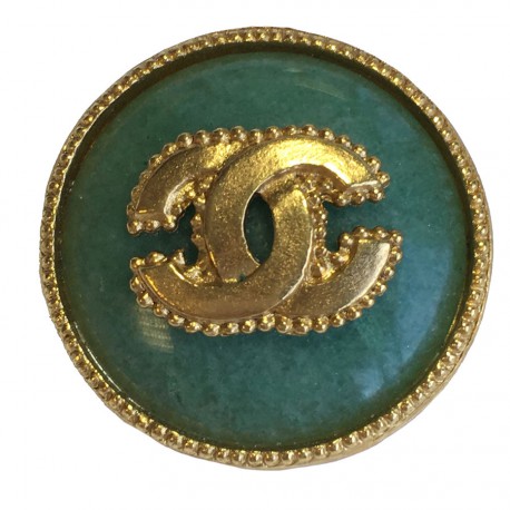 Broche CHANEL ronde en métal doré et pierre semi précieuse couleur jade