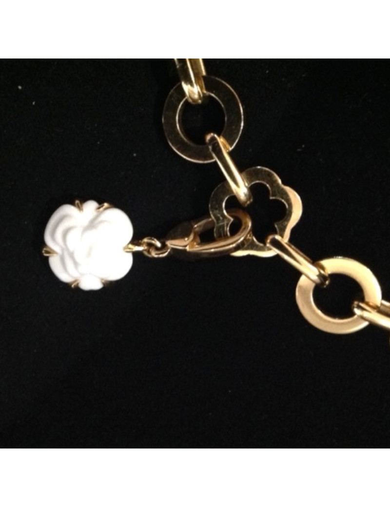 Collier CHANEL en or jaune et charms 