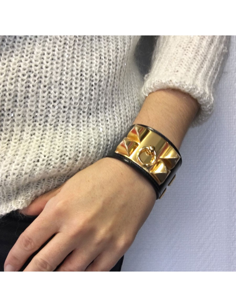 Manchette MEDOR HERMES en cuir box veau noir et bijouterie laiton plaqué or