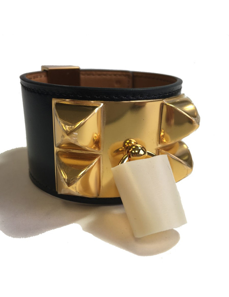 Manchette MEDOR HERMES en cuir box veau noir et bijouterie laiton plaqué or