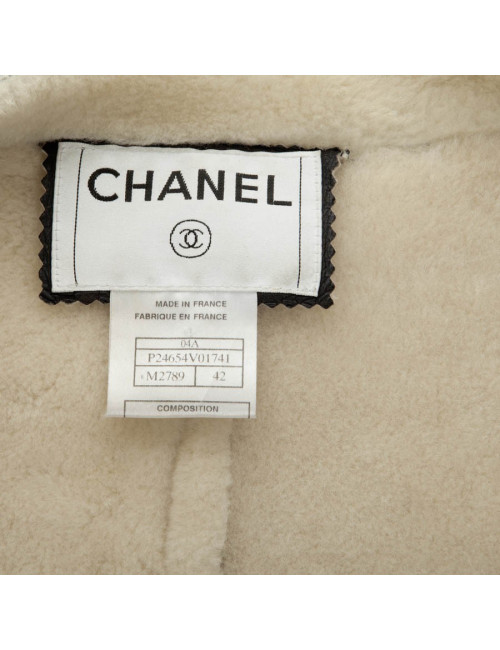 Veste CHANEL T 42 peau retournée noir interieur blanc