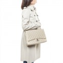 CHANEL maxi jumbo double flap bag in beige quilted leather