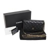 Mini black quilted lambskin CHANEL bag