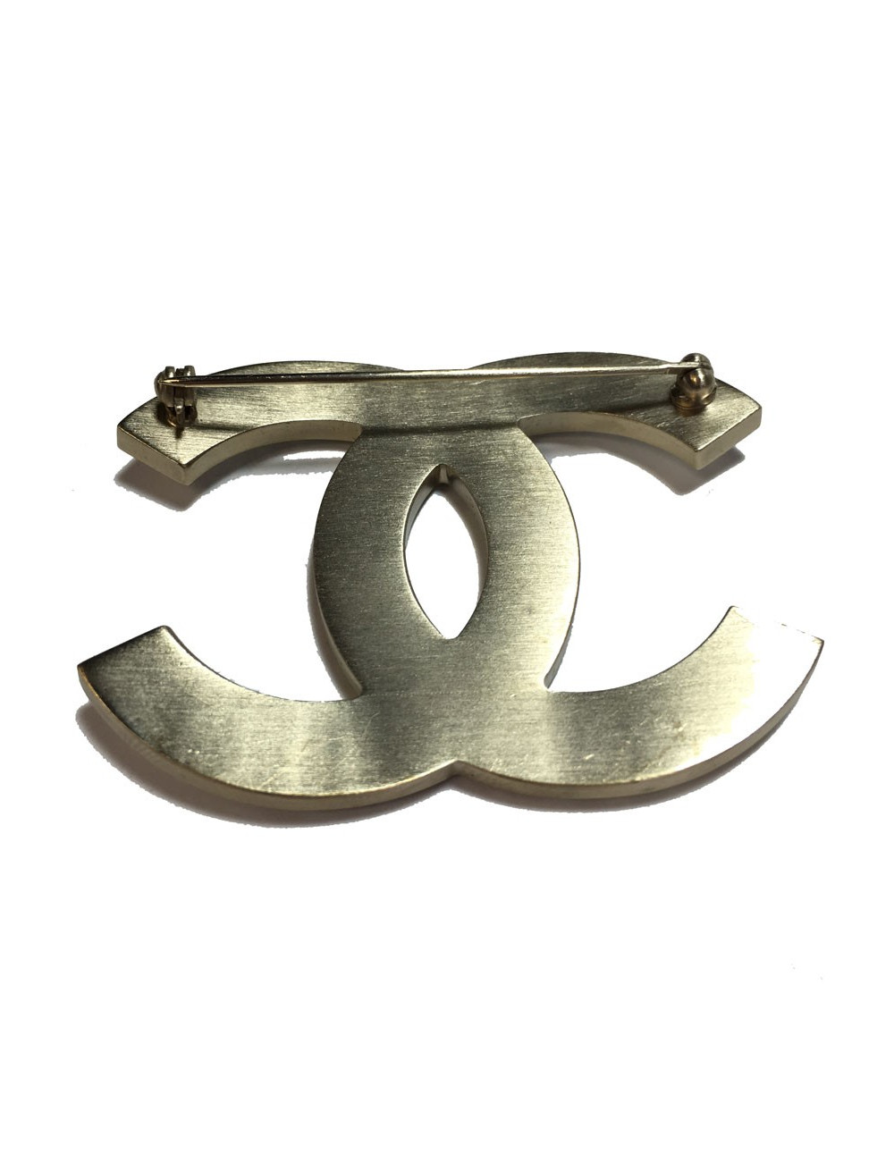 Broche CHANEL CC en strass et métal doré or pâle