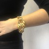 Bracelet CHANEL CC en maille en métal doré