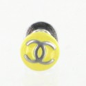 Enamelled yellow CHANEL and CC silver pins
