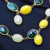 Saltire cabochons MARGUERITE DE VALOIS in yellow and emerald green glass