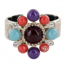 CHANEL gold metal cuff and multicolored resin