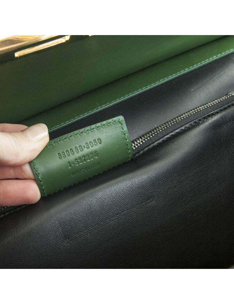 The ten BALENCIAGA green smooth leather bag