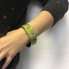 Bracelet HERMES en émail vert finition plaqué or