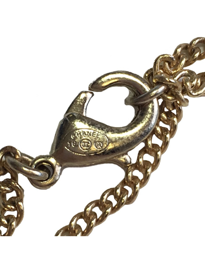 Collier CHANEL en métal doré,  pendentif  serti de petites perles noires