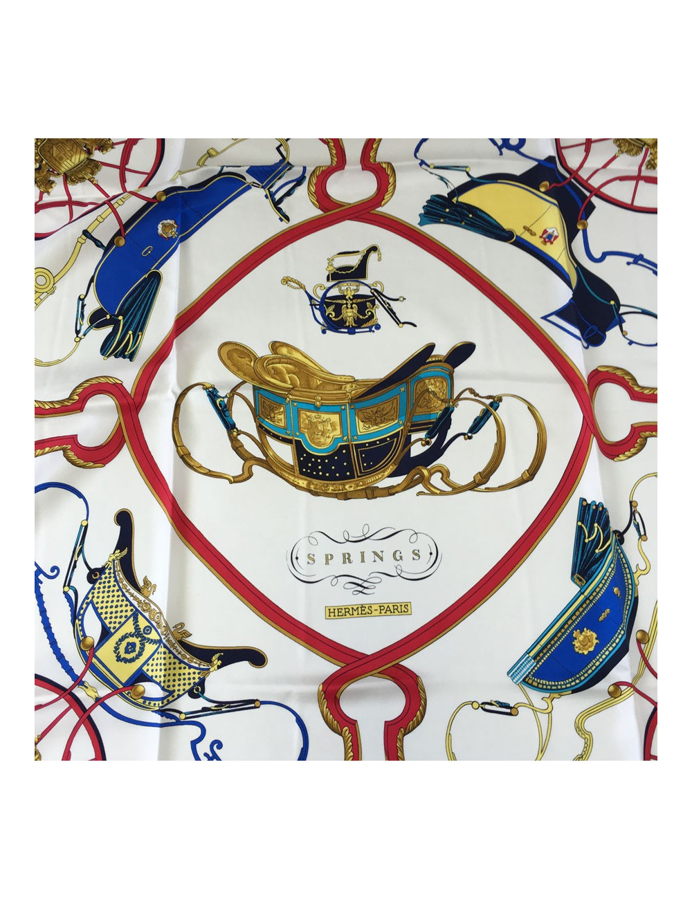 xxx Carré HERMES "Springs" en soie multicolore sur fond blanc