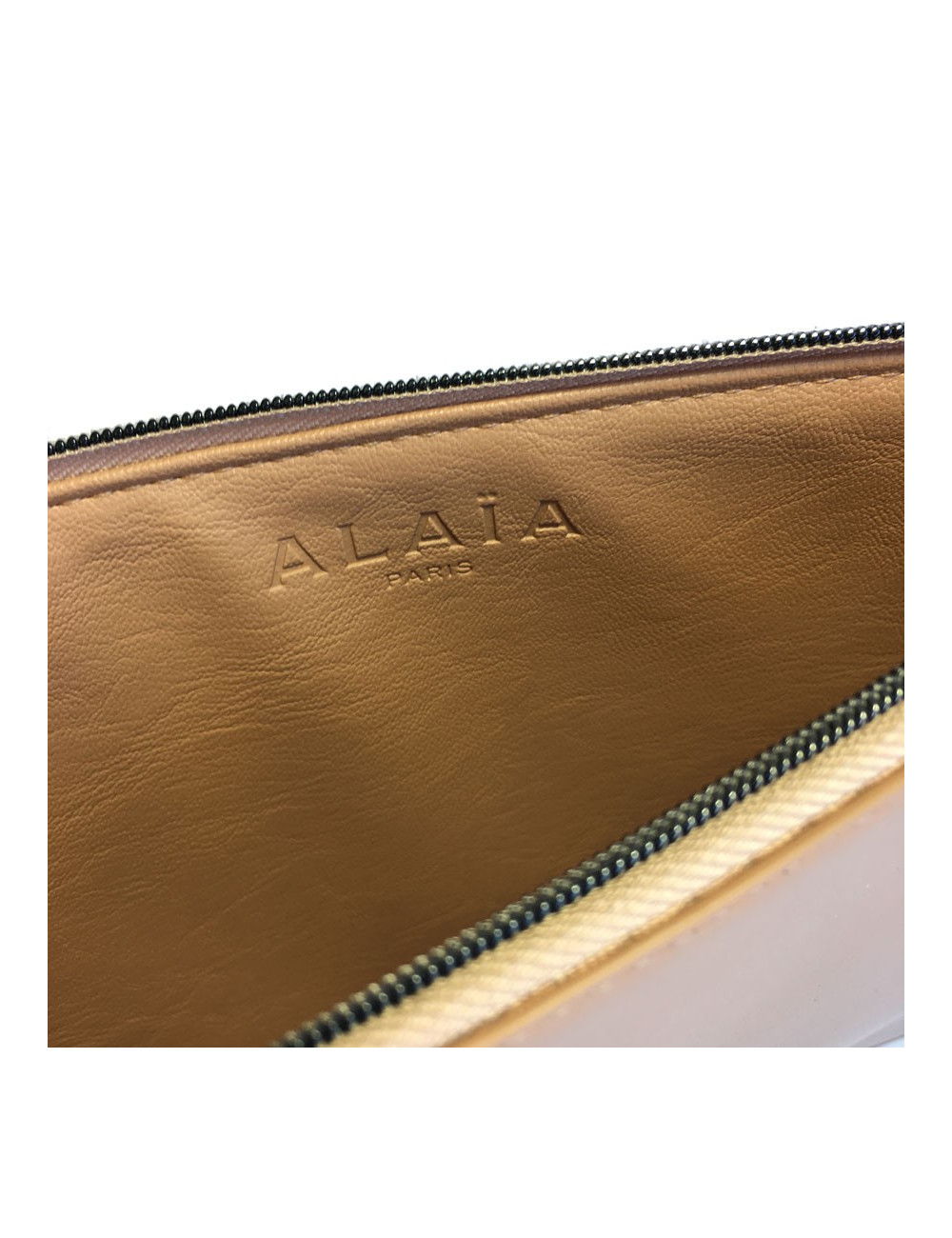 Pochette ALAIA en cuir rose poudré