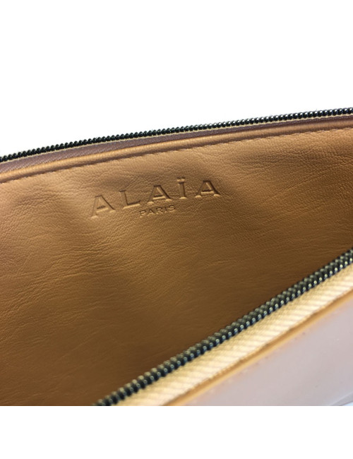 Pochette ALAIA en cuir rose poudré