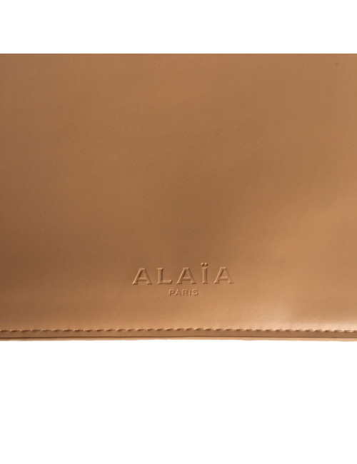 Pochette ALAIA en cuir rose poudré