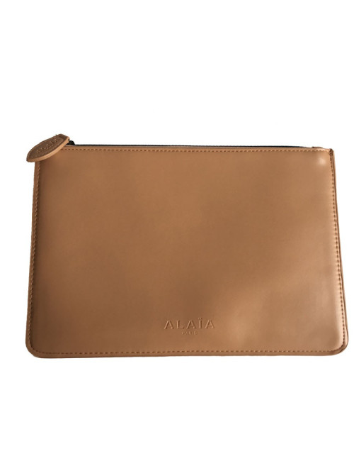 Pochette ALAIA en cuir rose poudré