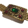CHANEL couture belt in aged gilded metal and colored molten glass stones