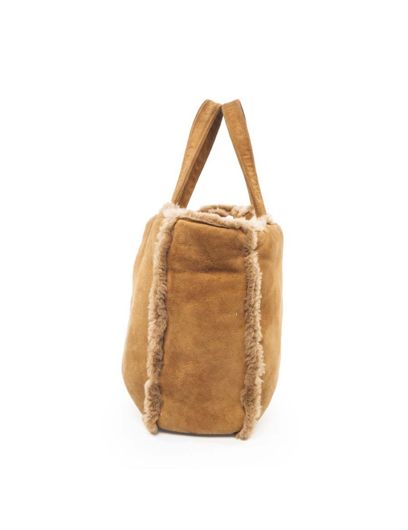 à réparer la poche Sac cabas CHANEL en peau retourné marron