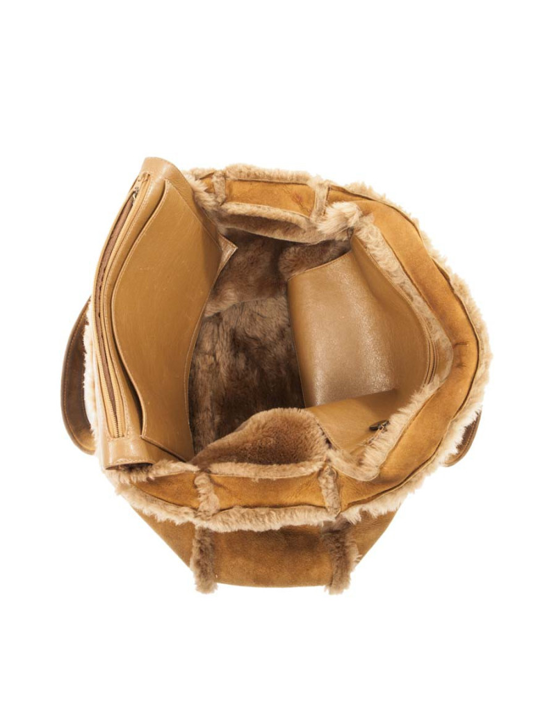 à réparer la poche Sac cabas CHANEL en peau retourné marron