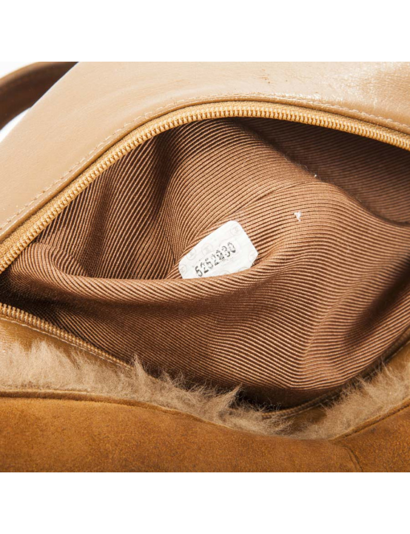 à réparer la poche Sac cabas CHANEL en peau retourné marron
