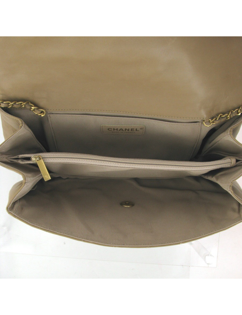 Sac CHANEL "3 fermoirs" en cuir matelassé beige