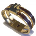 LOEWE rigid bracelet in gilt metal and brown leather